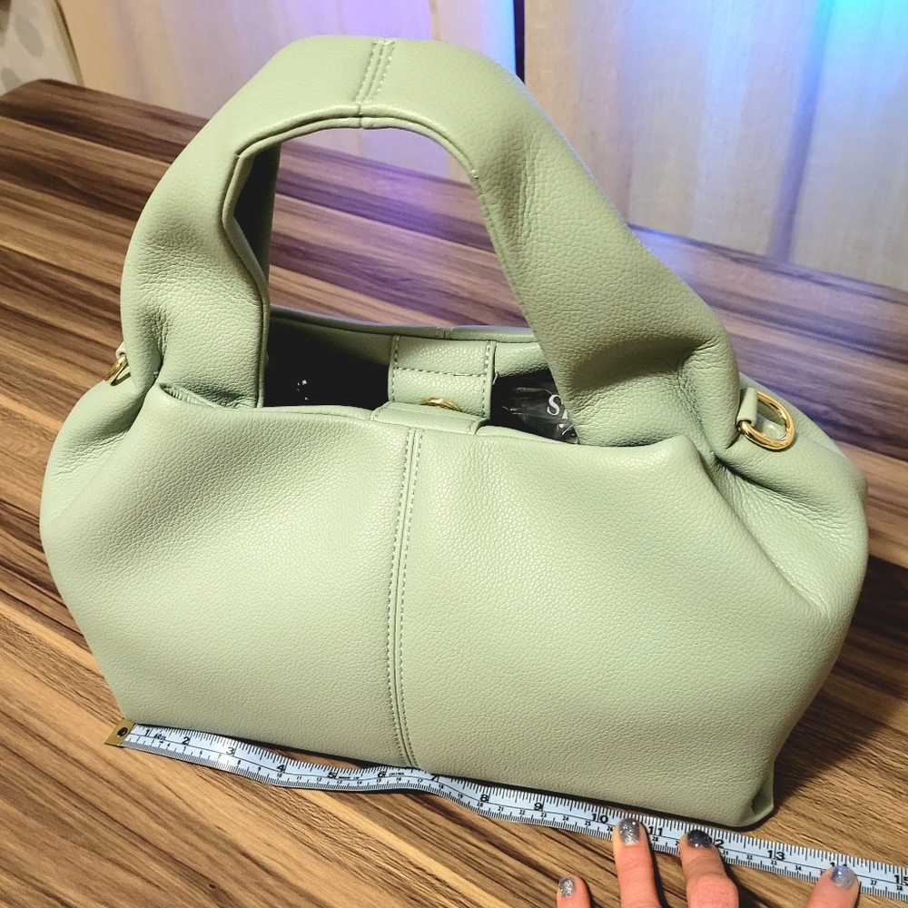 NWOT Mint color leather dumpling bag with removable crossbody strap